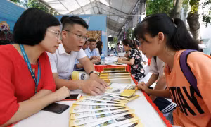 Học viện Tài chính tư vấn xét tuyển tại Ngày hội Tư vấn xét tuyển Đại học, Cao đẳng năm 2019. Ảnh: Anh Tuấn - TTXVN