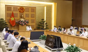 Phó Thủ tướng Vũ Đức Đam chủ trì họp Ban Chỉ đạo về công tác phòng, chống dịch hiện nay. Ảnh: Văn Điệp - TTXVN
