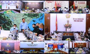Họp triển khai ứng phó ATNĐ trực tuyến với các địa phương. Ảnh: Vũ Sinh - TTXVN 