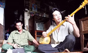 Cha, con và cây đàn tính