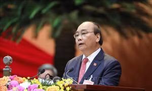 Đồng chí Nguyễn Xuân Phúc, Uỷ viên Bộ Chính trị, Thủ tướng Chính phủ thay mặt Đoàn Chủ tịch đọc Diễn văn khai mạc Đại hội. Ảnh: TTXVN