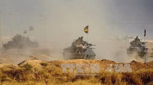 Nhiều người nhập viện do khói độc gần Mosul ảnh 1