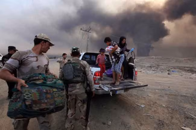 Cuộc sống vạ vật khi tháo chạy khỏi Mosul ảnh 2