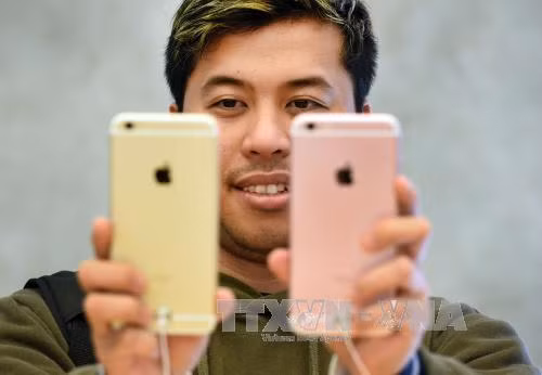 Cổ phiếu Apple rớt giá do iPhone giảm sức hút ảnh 1