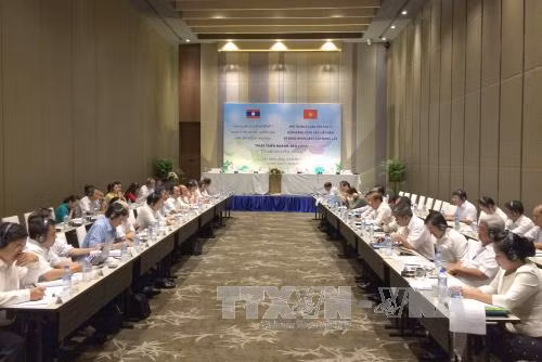Hội thảo Lý luận lần thứ 5 giữa Đảng Cộng sản Việt Nam và Đảng Nhân dân Cách mạng Lào ảnh 1