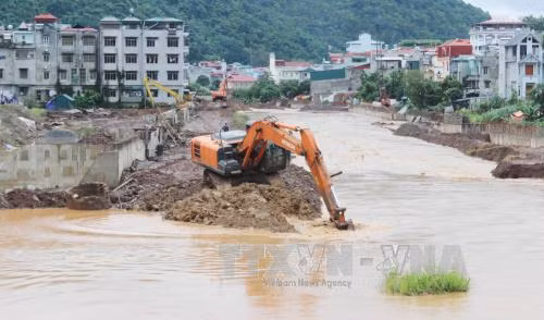 Mưa lũ làm ít nhất 20 người chết và mất tích ảnh 2