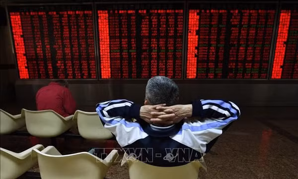 Hình minh hoạ sàn giao dịch chứng khoán Trung Quốc. Ảnh: AFP/TTXVN (Không được phép chia sẻ và sử dụng bởi bên thứ ba)