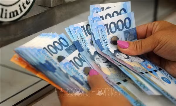 Đồng peso của Philippines. Ảnh tư liệu: AFP/TTXVN (Không được phép chia sẻ và sử dụng bởi bên thứ ba)