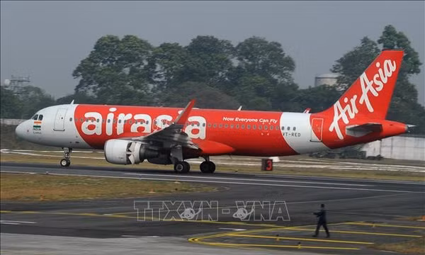 Máy bay của hãng hàng không AirAsia. AFP/TTXVN (Không được phép chia sẻ và sử dụng bởi bên thứ ba)