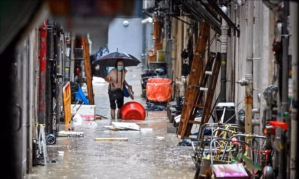 Hình minh họa thời tiết mưa bão. Ảnh: AFP/TTXVN (không được phép khai thác, sử dụng bởi bên thứ ba)