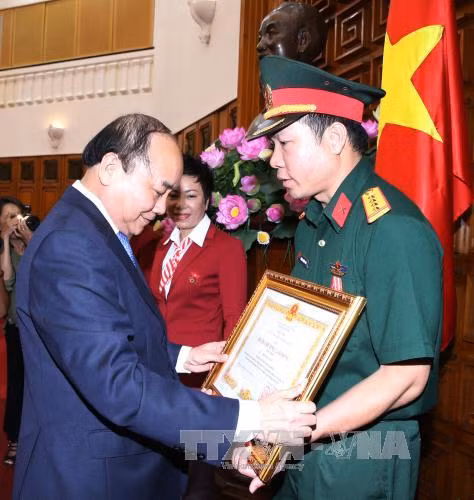 Thủ tướng gặp gỡ Đoàn Thể thao Việt Nam dự Olympic ảnh 1