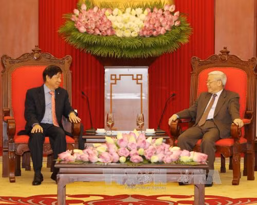 Tổng Bí thư, Thủ tướng tiếp Đoàn cấp cao Đảng Hành động Nhân dân Singapore ảnh 1