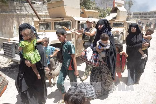 Các lực lượng Iraq mở đường thoát cho hàng trăm dân thường tại Mosul ảnh 1