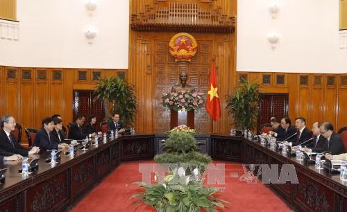 Tổng Bí thư, Thủ tướng tiếp Đoàn cấp cao Đảng Hành động Nhân dân Singapore ảnh 2