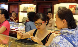 Cầu ít, giá vàng trong nước thấp hơn thế giới