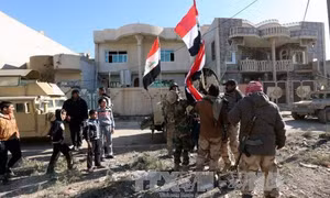 Iraq giành lại 31 quận ở Mosul, ông Carter bất ngờ tới Baghdad