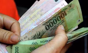 Mức đóng BHXH không thấp hơn mức lương tối thiểu vùng