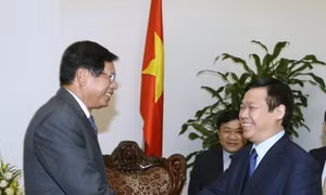 Việt Nam ủng hộ hợp tác nghiên cứu chính sách kinh tế với Lào