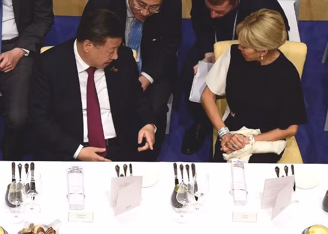 Hình ảnh Tổng thống Putin và Đệ nhất Phu nhân Mỹ thân mật trò chuyện ở tiệc tối ảnh 6