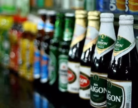Doanh nghiệp bia lo lắng nếu phải dán tem lên sản phẩm ảnh 1