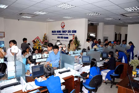 Chờ đợi hiệu quả sau sáp nhập ngân hàng ảnh 1