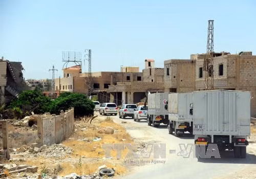 Quân đội Syria và lực lượng nổi dậy chấm dứt bao vây Daraya ảnh 1