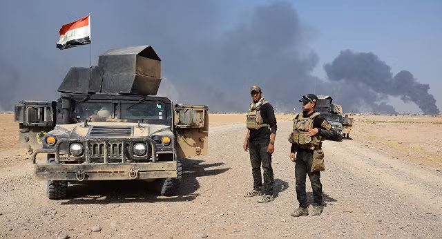 Iraq giành lại thị trấn chủ chốt ở phía Nam Mosul ảnh 1