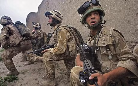 NATO thảo luận việc rút quân khỏi Ápganixtan ảnh 1