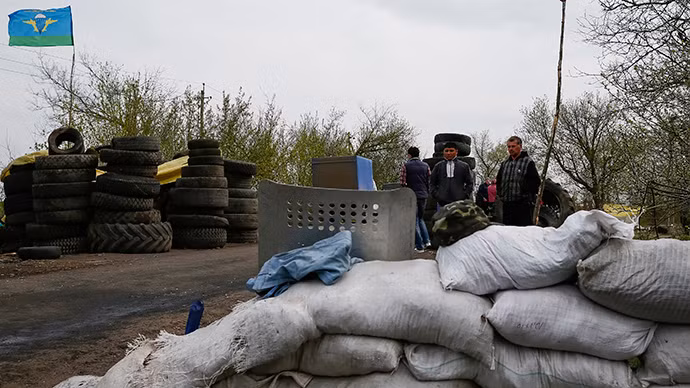 Xung đột đổ máu lại nổ ra ở miền Đông Ukraine ảnh 1
