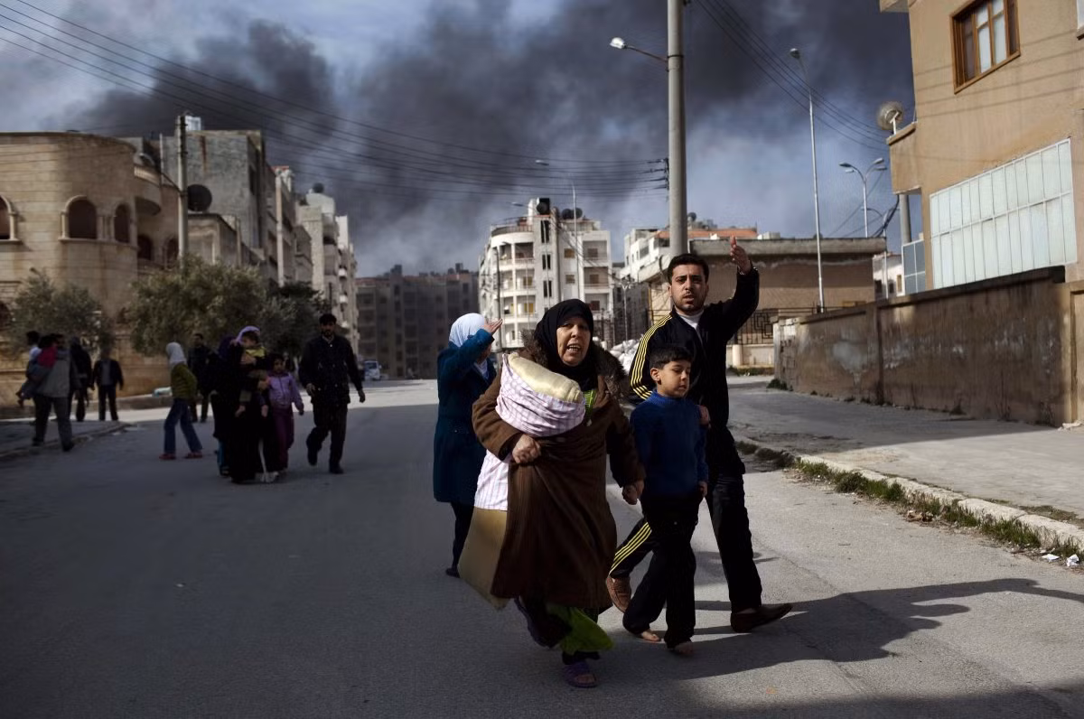 Ảnh đoạt giải đầy ám ảnh về cuộc chiến Syria ảnh 4