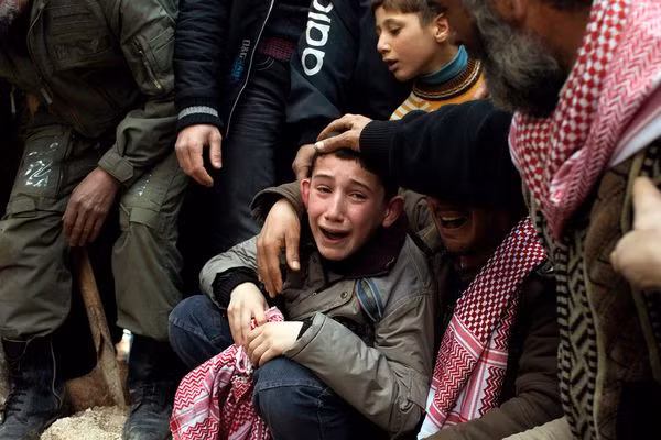 Tuổi thơ bị đánh cắp của trẻ em Syria ảnh 9
