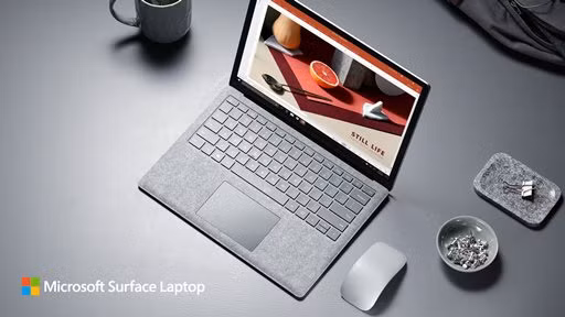 Microsoft trình làng laptop pin 'khủng' 14,5 tiếng, giá từ 999 USD ảnh 1
