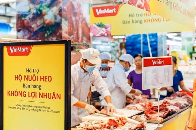 Nhiều siêu thị, doanh nghiệp tham gia giải cứu thịt lợn, bán hàng không lợi nhuận ảnh 1