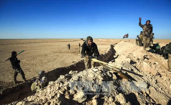 Thủ tướng Iraq ra lệnh không kích IS bên trong lãnh thổ Syria ảnh 1