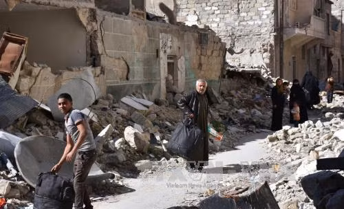 Quân đội Syria giành lại căn cứ không quân từ tay IS ảnh 1