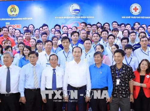 Chủ tịch nước: Chăm lo đời sống vật chất và tinh thần cho người lao động ảnh 1