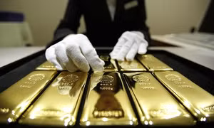 Vàng mất giá sau quyết sách của FED