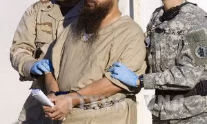 Sắp rời Nhà Trắng, ông Obama quyết chuyển tù nhân khỏi Guantanamo
