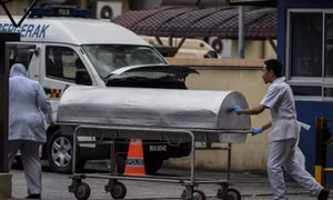 Truyền thông đưa tin thi thể 'ông Kim Jong-nam' bị đưa đi hỏa táng