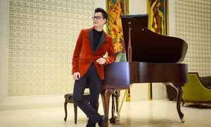 Quang Dũng cười rạng rỡ trong họp báo giới thiệu liveshow 