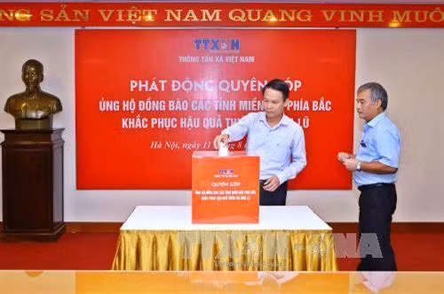 TTXVN ủng hộ đồng bào các tỉnh Tây Bắc khắc phục thiệt hại do mưa lũ