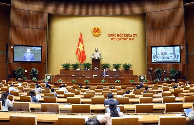 Bộ trưởng Bộ Lao động, Thương binh và Xã hội Đào Ngọc Dung phát biểu giải trình, làm rõ một số vấn đề đại biểu Quốc hội nêu. Ảnh: Phạm Kiên - TTXVN