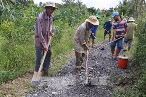 Lão nông Lê Văn Tám tích cực tham gia xây dựng nông thôn mới ở vùng ngập lũ