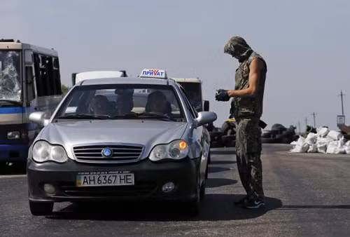 Binh sĩ hai phe Ukraine thấp thỏm chờ ngừng bắn ảnh 3