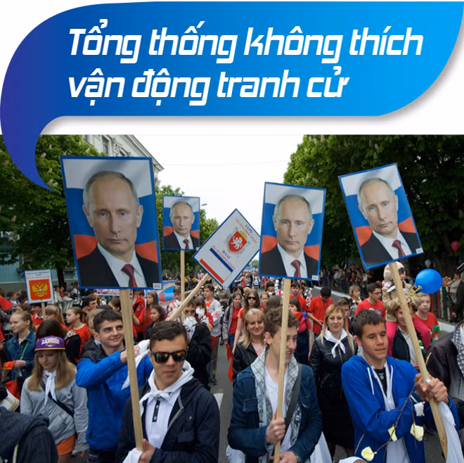 Người dân diễu hành ngày 1/5/2014 với ảnh chân dung ông Putin ở Simferopol, Crimea. Ảnh: AP