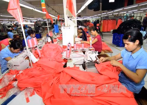 Tăng lương tối thiểu liên quan đến sự phát triển của doanh nghiệp ảnh 1