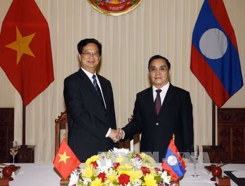 Việt-Lào quyết tâm cao tăng cường mối quan hệ đoàn kết đặc biệt ảnh 1