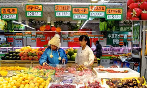 Trung Quốc điều chỉnh tăng GDP năm 2013