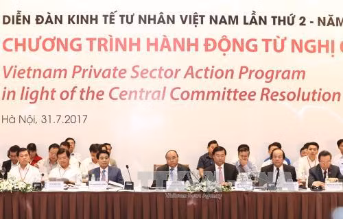 Thủ tướng Nguyễn Xuân Phúc: Doanh nghiệp tư nhân phấn đấu đóng góp 50 - 60% GDP ảnh 1
