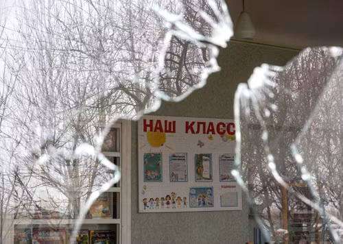 Miền Đông Ukraine đổ nát, hoang tàn ảnh 10